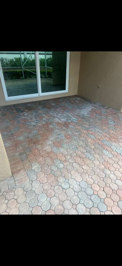 Before: faded lanai pavers