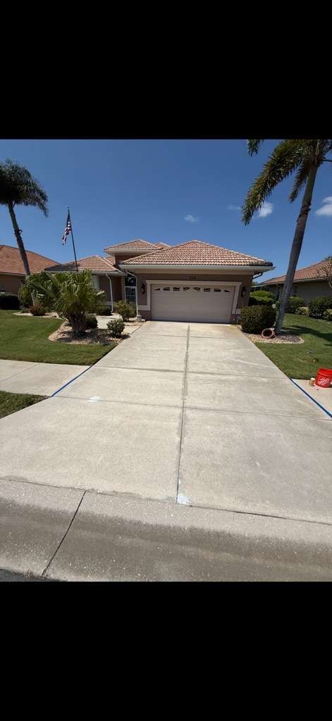 Before: weathered concrete driveway