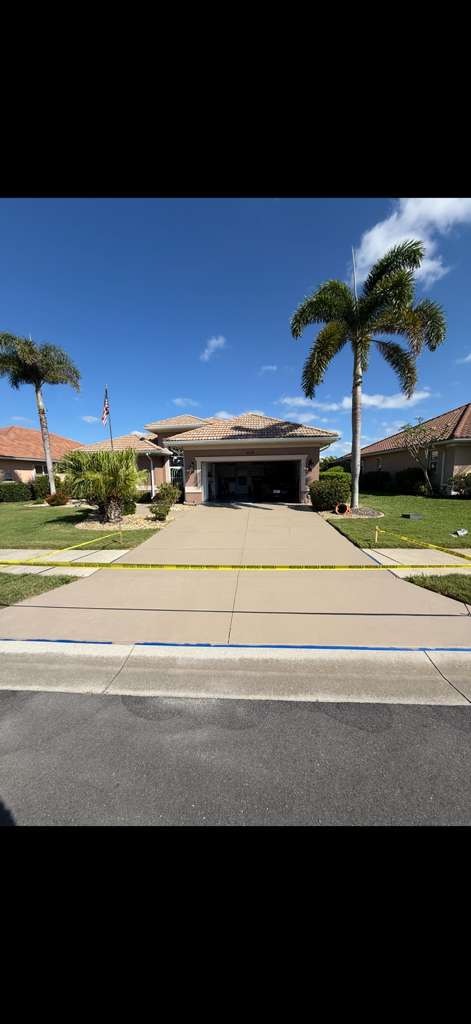 After: freshly painted driveway