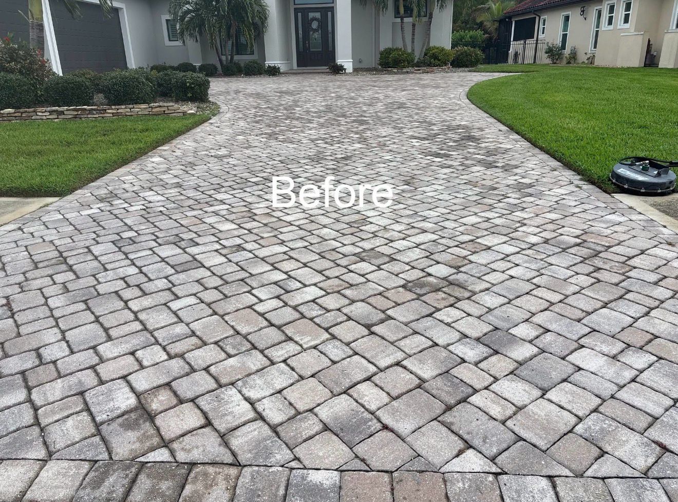 Before: faded paver driveway